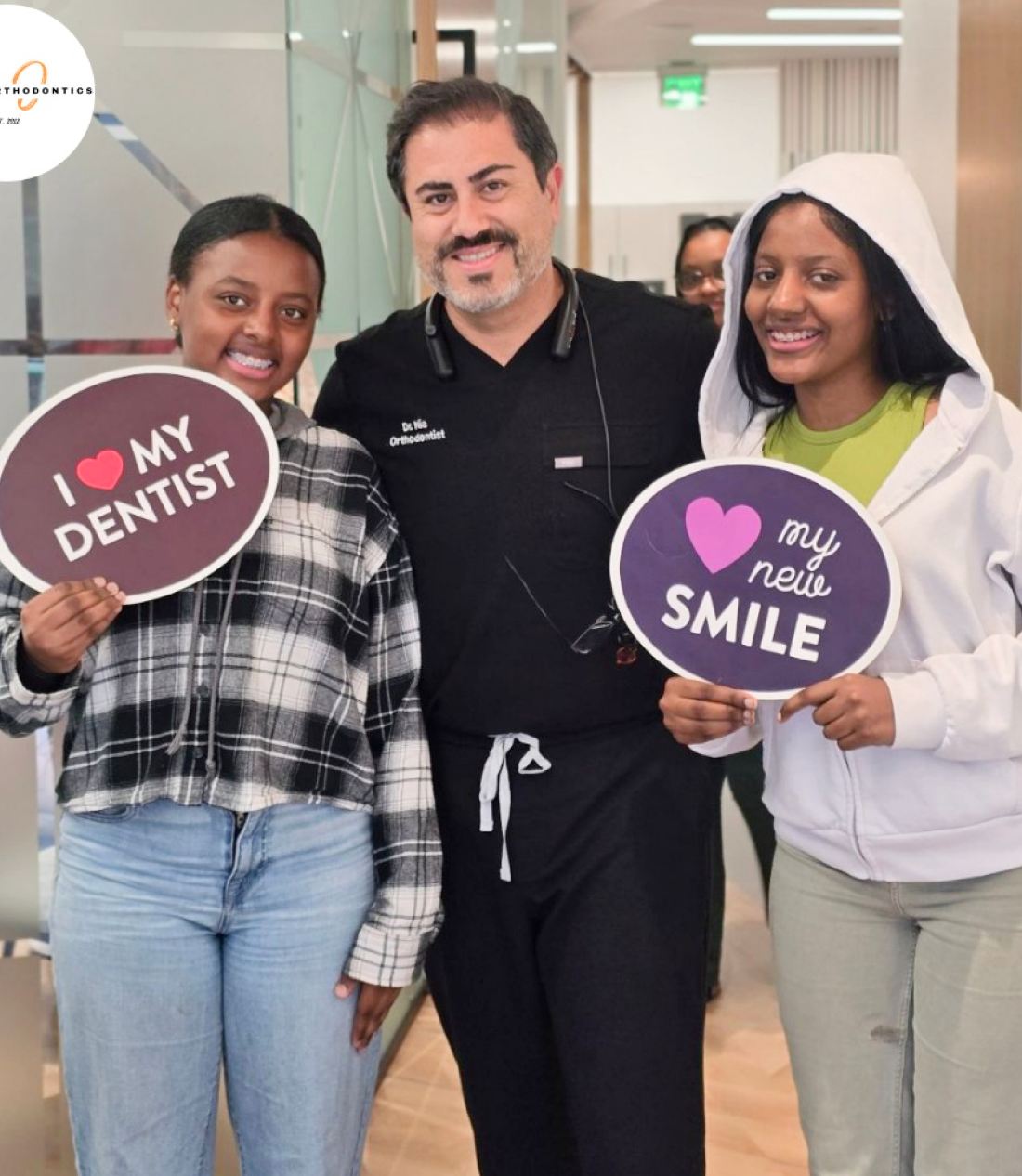 Dr. Mia and two patients posing for a picture